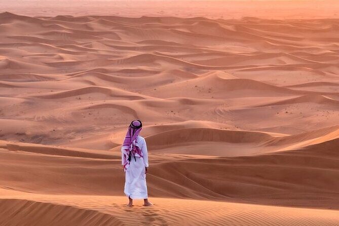 4hr Desert Safari: Sunset,Sunrise,Camel,Sand boarding,Inland Sea - Sand boarding from high dunes: the best part to plan around