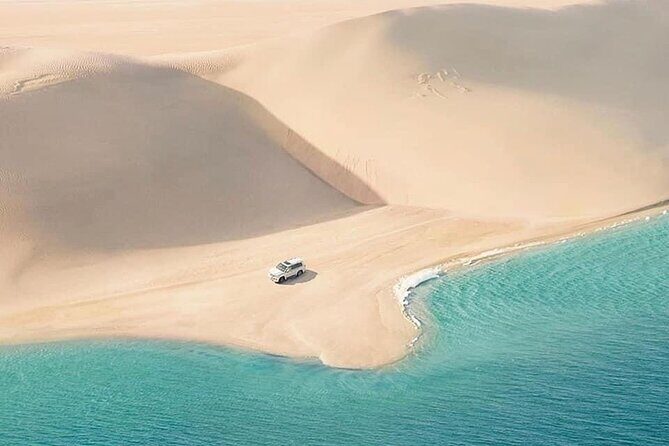 4hr Desert Safari: Sunset,Sunrise,Camel,Sand boarding,Inland Sea - Singing dunes (الـدوبه) and watching paragliders launch