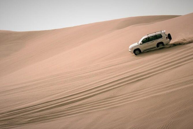 Desert Combo safari, Camel ride, Quad Bike and Dune Bashing(ALL INCLUSIVE) - Dune Bashing: The Desert Rollercoaster Part