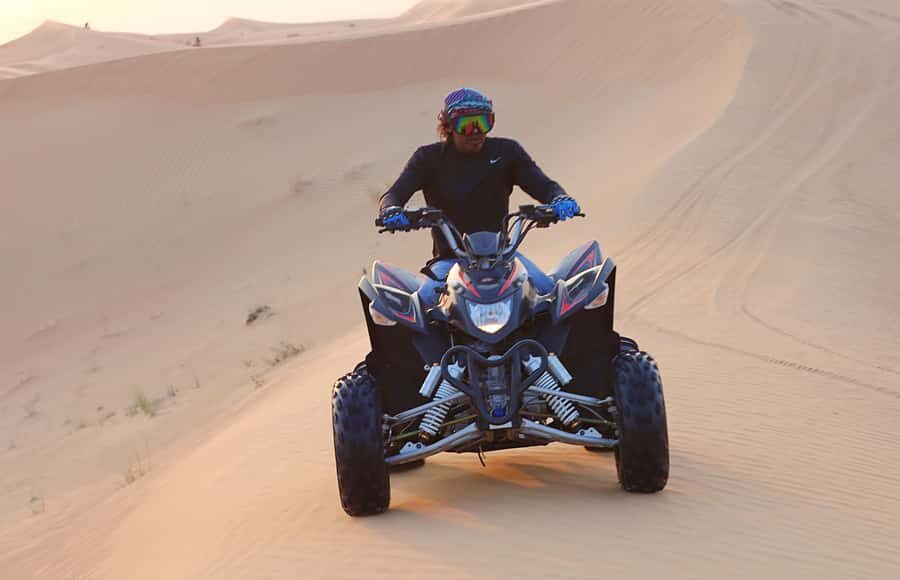 Desert Safari, Quad Bike, Camel Ride, Falcon & Sandboarding - 30 minutes on a quad bike: the adrenaline you came for