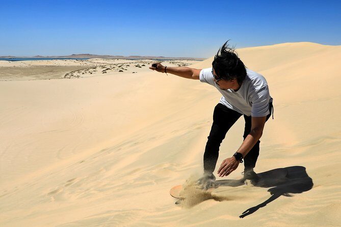 Desert Safari with Camel Ride, Sand Boarding & Inland Sea Tour in Doha - Pickup, meeting point, and how to avoid timing stress