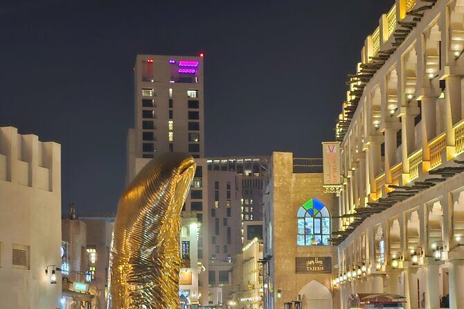 Doha All Inclusive Night City Tour with Traditional Dhow Boat - Stop 5: The Pearl Island—luxury contrast with a quick look