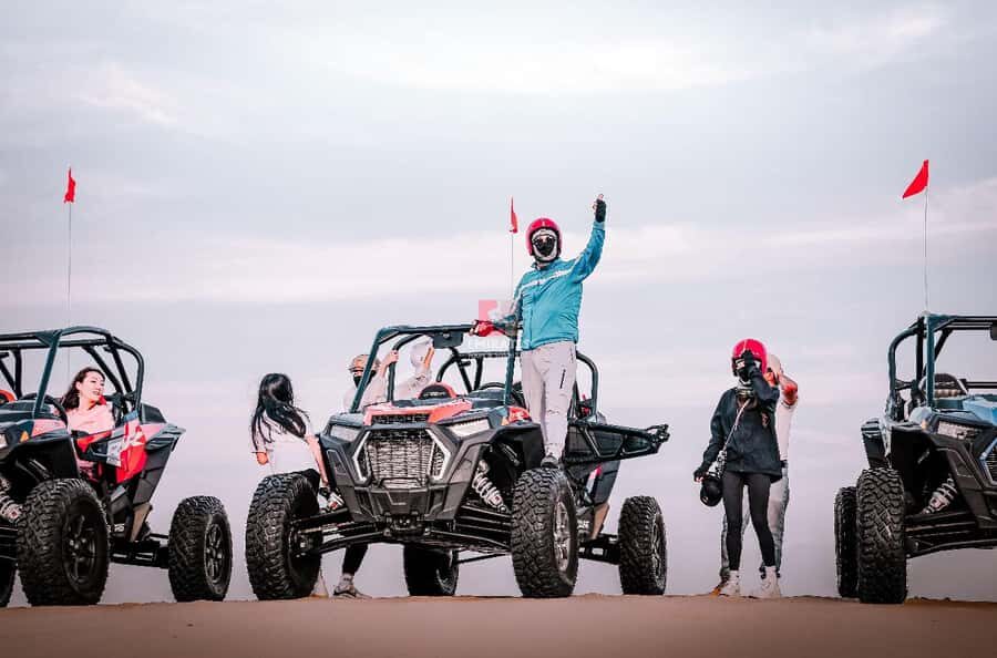 Doha: ATV Quad Bike and Buggy Desert Safari with Camel Ride - Dune bashing in a 4WD Toyota: where the adrenaline comes from