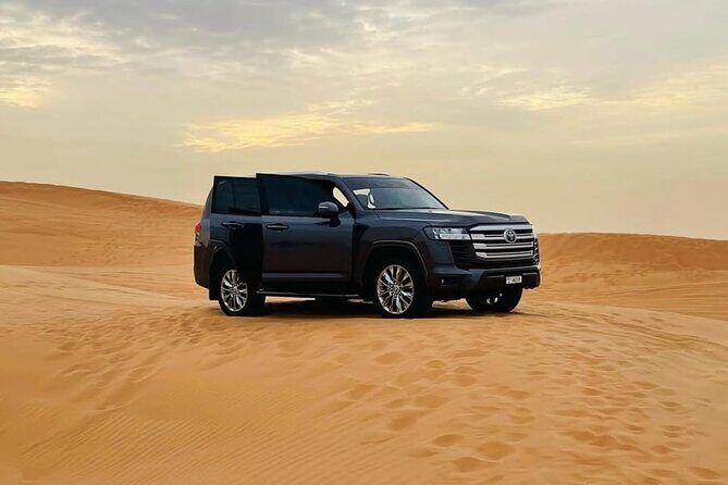 Doha: Desert Safari: Dune Bashing, Quad Bikes & Camel Rides - Sealine Beach Stops: Tea, Coffee, Toilets, and Camel Photos