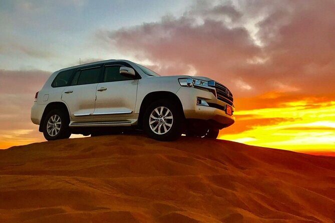 Doha Desert Safari Quad Bike Buggy Camel Ride and Inland Sea Tour - Sealine Sand Dunes: desert safari with sandboarding stops