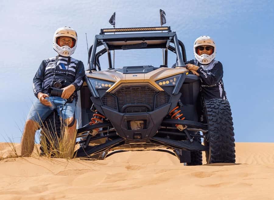 Doha: Desert Safari, Quad Biking, Sand Boarding & Camel Ride - Seaway stop at Sealine Beach, Mesaieed: camel ride option and a stretch break