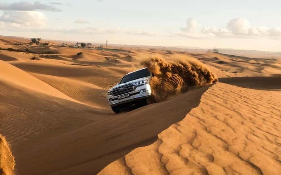 Doha: Half Day Desert Safari, Dune Bashing, Camel Ride - From Doha Pickup to Mesaieed: Getting Into the Desert Mood Fast