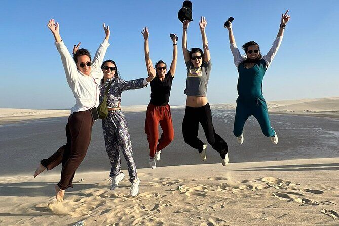 Doha Half Day Desert Safari Dune Bashing Camel Ride Sandboarding - Khor Al Udeid Beach Time: Sandboarding on the Inland Sea Dunes