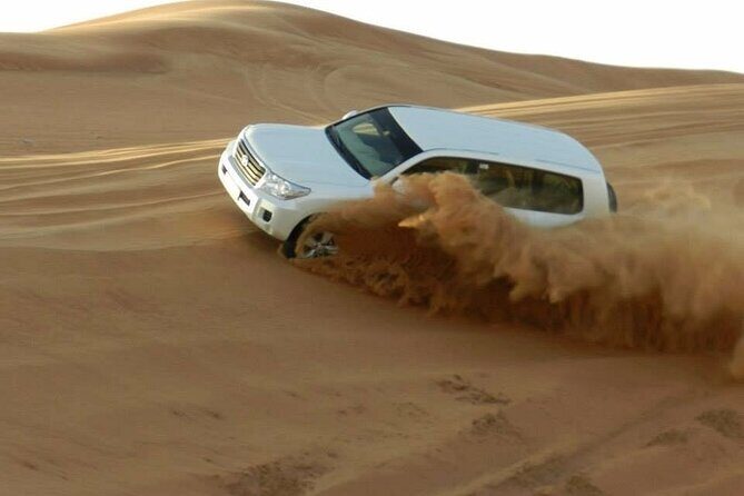 Doha Half Day Desert Safari Dune Bashing CamelRide & Sandboarding - Key highlights in plain English