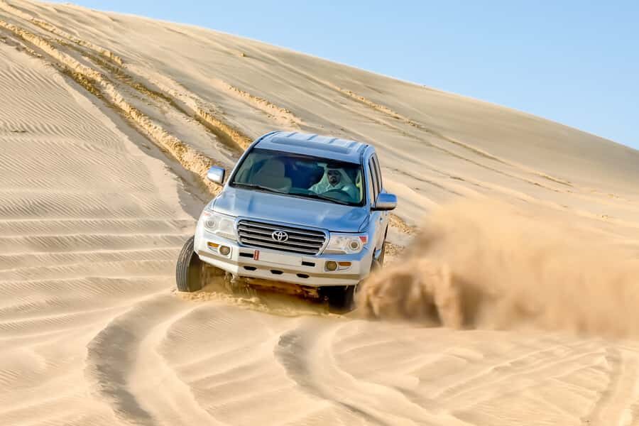 Doha: Half-Day Desert Safari, Quad Bike, Camels & Inland Sea - Sandboarding (about 20 minutes): the fastest way to feel like you’re in a movie