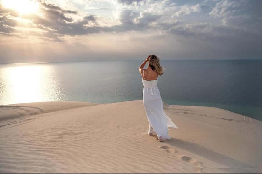 Doha: Inland Sea Desert Safari With All Activities - Getting to the dunes: Doha pickup from Qatar National Museum Metro