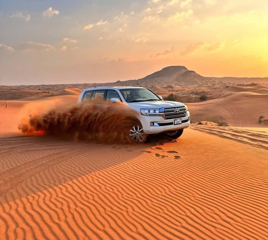 Doha: Inland Sea Desert Safari with Sunset & Sunrise Views - Sandboarding on the Dunes: Fun, Gravity, and a Few Smart Tips