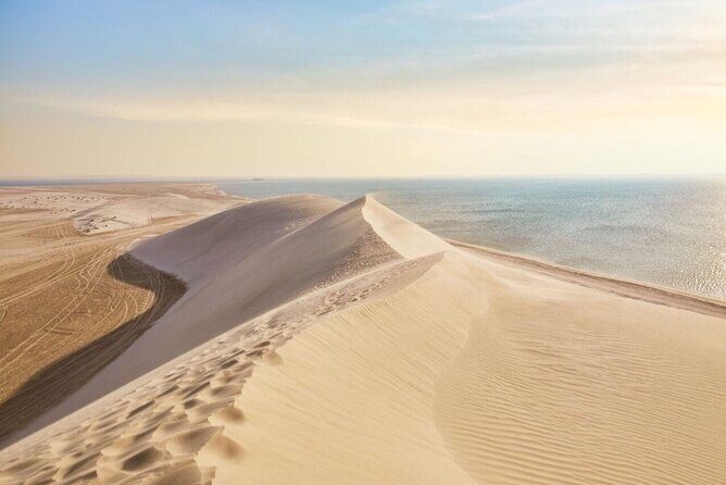 Doha Layover or Doha Stopover Tour with Desert & City Tour - Desert safari: dune bashing plus sand boarding and beach time