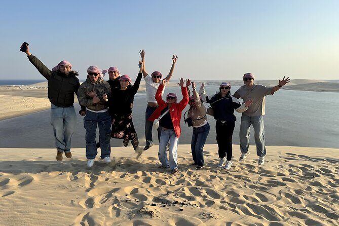 Doha: Luxury Desert Safari, Quad Bike & Sandboarding - The Inland Sea stop near Khor Al Udaid: blue water and Saudi mountain views