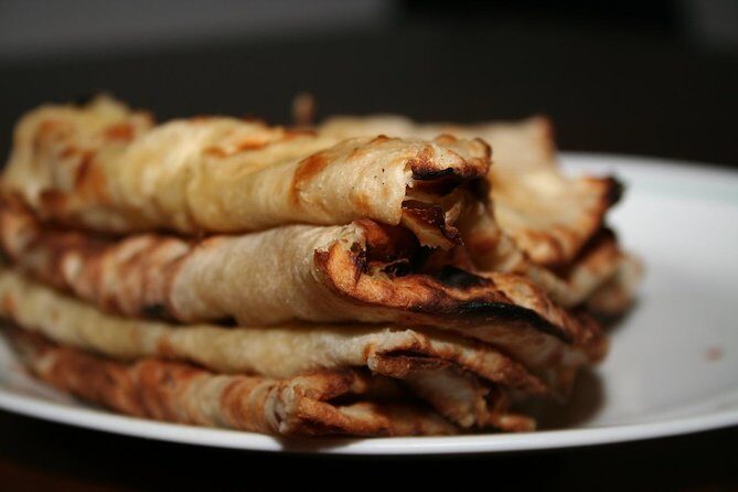 Doha: Pearl Island Food Tour – 7 Tastings, AC Vehicle - Optional marina boat ride: what it adds