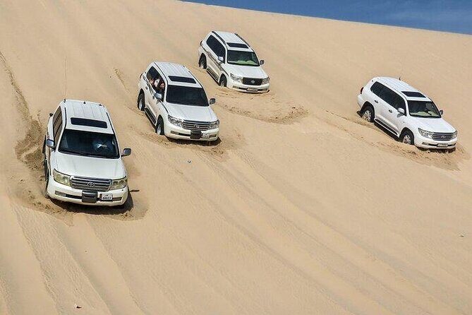Doha Qatar ATV Quad Bike Buggy Desert Adventure and Camel Ride - Sealine Beach dune bashing plus sandboarding