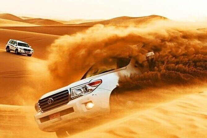 Doha Qatar ATV Quad Bike Buggy Desert Adventure and Camel Ride - Guide style and safety: the names that keep coming up