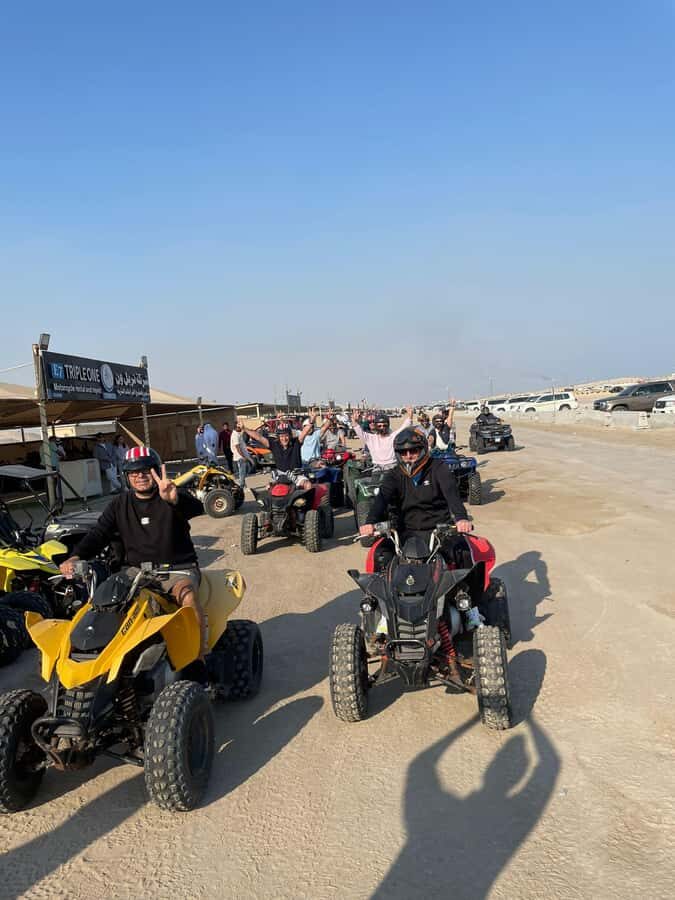 Doha: Quad Bike, Desert Safari, Buggy ride & inland sea tour - Camel Ride and Falcon Photos: Quick, But Meaningful