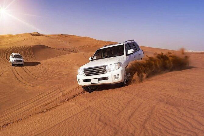 Doha: Quad Bike, Dune Bashing, Camel Ride & Inland Sea Tour - Sandboarding and Photo Stops: Getting Your Best Shots Without a Long Wait