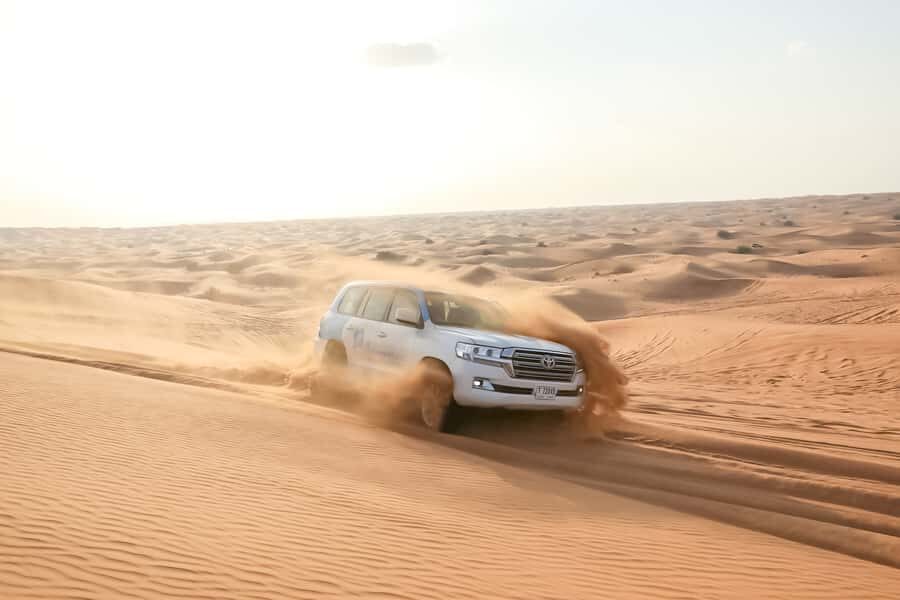 Doha: Safari, ATV, Camels, Sandboarding and Inland Sea Tour - Sandboarding runs: what to do so your feet stay put