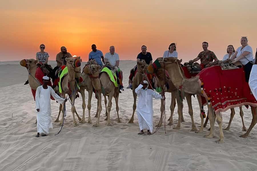 Doha Safari: ATV Ride, Dune Bashing, & Sandboarding Fun - Camel ride and tea stop: the calmer stretch you’ll actually appreciate