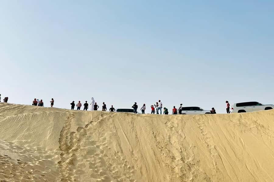 Doha Safari: ATV Ride, Dune Bashing, & Sandboarding Fun - Dune bashing with skilled drivers: where adrenaline meets control