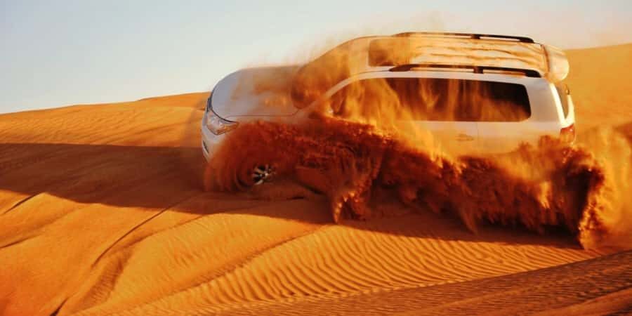 Doha: Safari, Camel Ride, Sandboarding and Inland Sea Tour - From Doha pickup to the Inland Sea, this starts fast