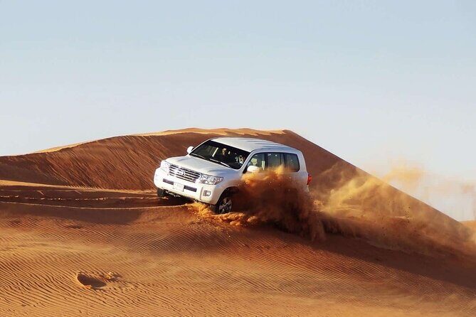 Doha Sharing Desert Safari with Dune Bashing and Sand Boarding - Sandboarding: Fun in Theory, Ask Early for How It Works