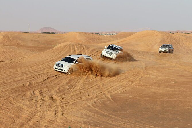 Doha Sharing Desert Safari with Dune Bashing and Sand Boarding - Dune Bashing in a 4x4: Thrill With a Safety Net