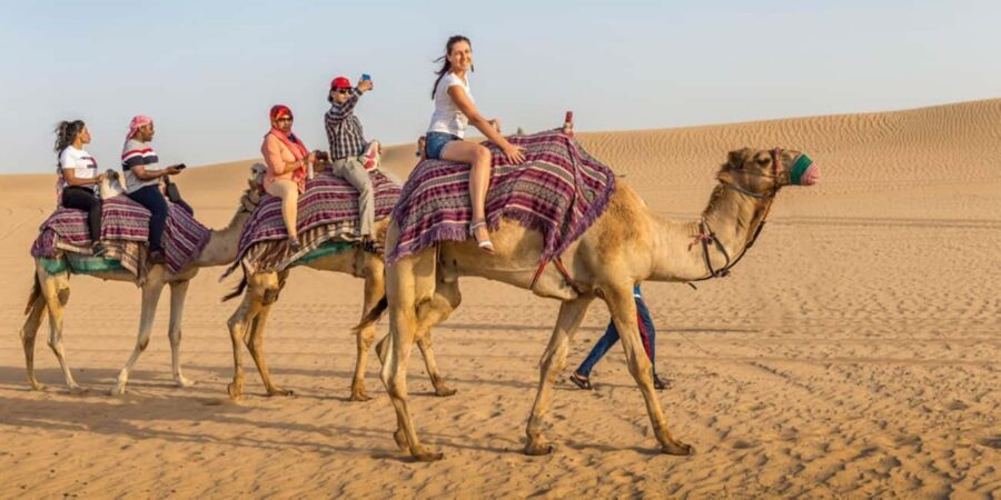 Doha: Sunset Desert Safari, ATV, Camel Ride and Sandboarding - Sandboarding and Quad Bike Options for Extra Adrenaline