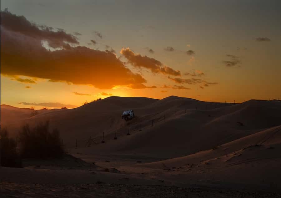 Doha: Sunset Safari, Dune Bashing, Sandboarding & Camel Ride - Camel ride basics: short, sweet, and timed well