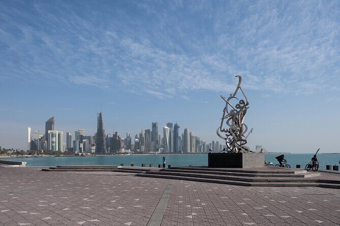 Experience Doha City tour with Local Guide and Dhow Ride - Doha Corniche: Palm-Fringed Views and Sea-Air Breaks