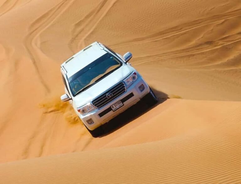 From Doha: Inland Sea Desert Safari with All Activities - Camel Ride Over the Dunes: Slow Motion, Big Views