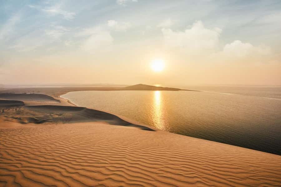 From Doha: Sunrise or Sunset Safari with Sand Boarding - Southbound Start: Sea Line Beach, Mesaieed Breaks, and Getting Set Up
