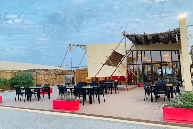 Full-day Qatar desert safari: dune bashing, sandboarding, camels - Price and what you’re really paying for at $192