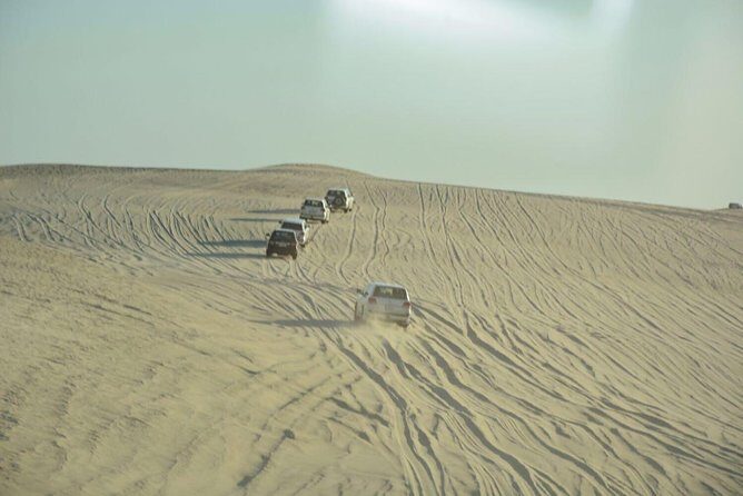 Premium Full-Day Safari, Dune Bash, Camel Ride and BBQ Meal in Desert Camp - Khor Al Udaid Beach Stop: A Short Nature Pause With Big Views