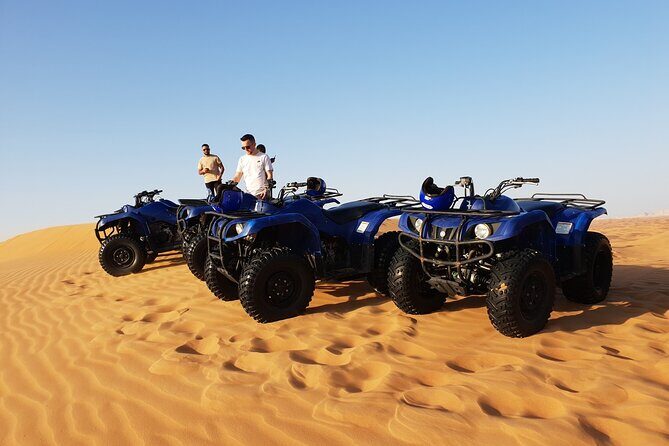 Qatar ATV And Quad Bike Experience With Sand Boarding - Quad biking on designated track: adrenaline, but with boundaries