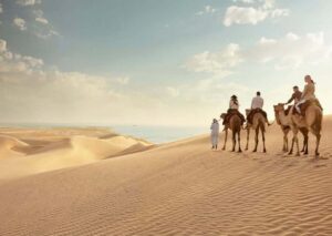 Qatar: ATV & Quad Dune Bashing, Camel Ride, & Sandboarding - Pickup, AC comfort, and the guides who set the tone