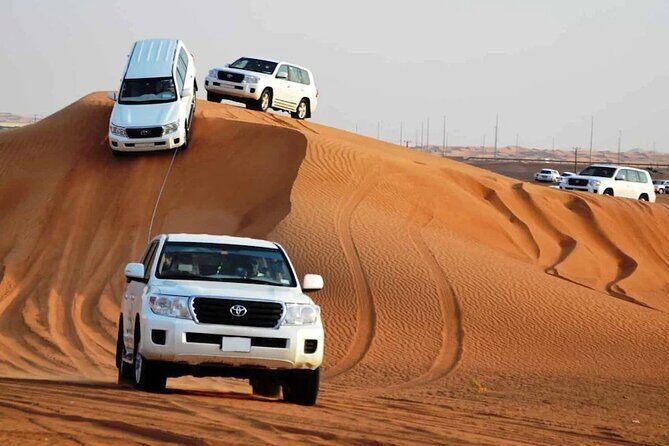 Qatar Desert Safari, Dune Bashing (Private Safari Tour) - Stop 1: Optional Camel Ride and Local Tea That Sets the Tone