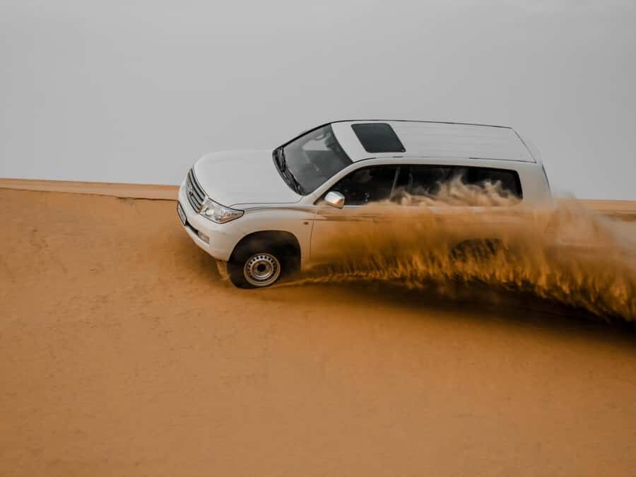 Qatar Desert Safari, Quad bike, Camel Ride and Sandboarding - Pickup from Doha and the Comfortable Ride Out