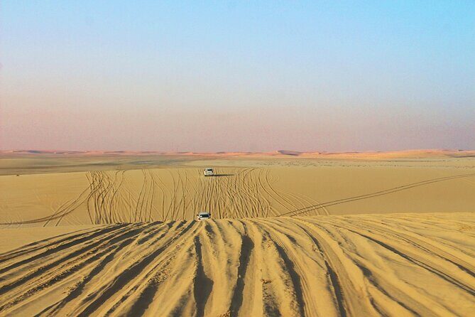 Qatar Gold Dune Safari, Dune Bashing,Camel Ride,Sand Boarding,Inland Sea Desert - Sandboarding on golden dunes: the fun part (and the gear rules)